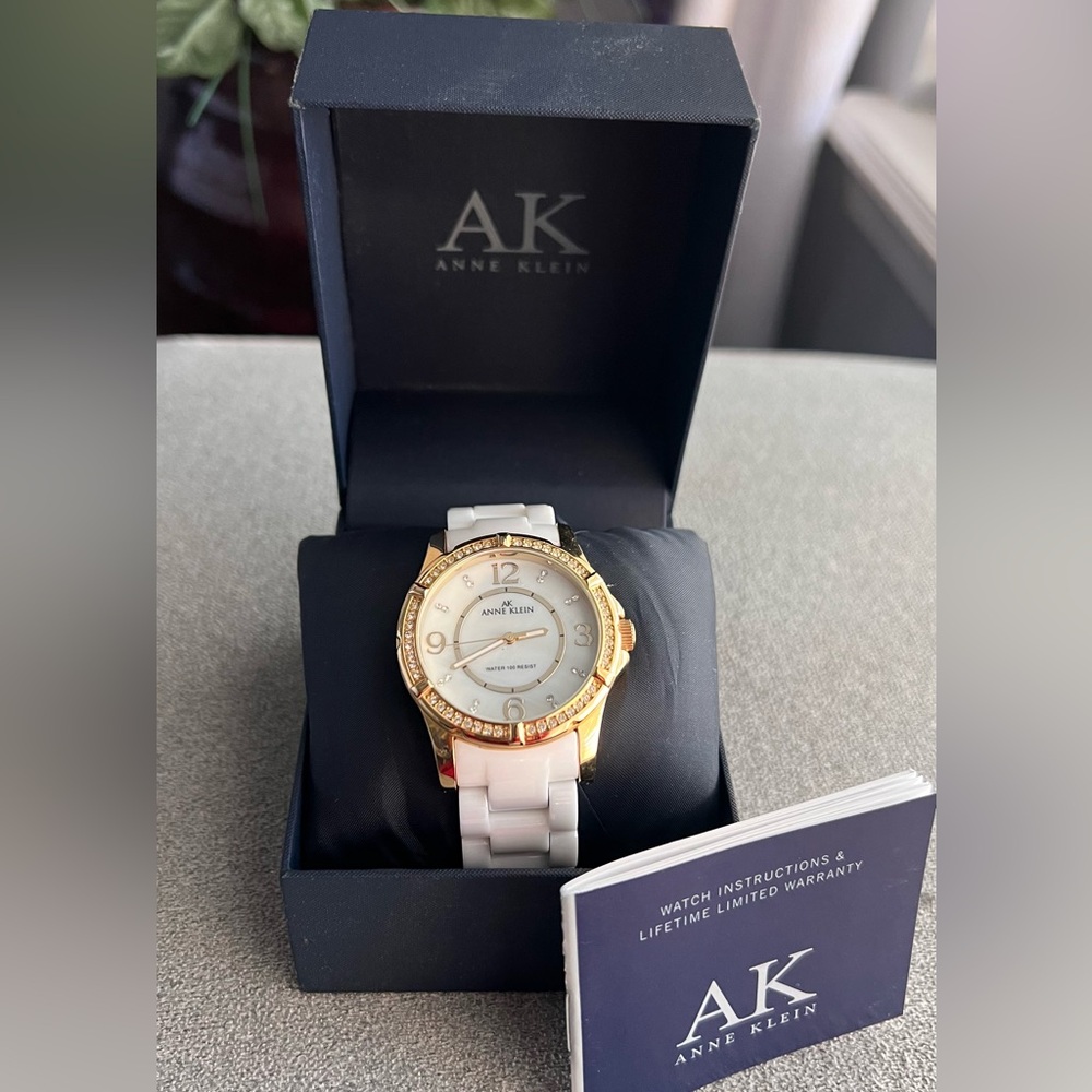 Anne Klein White Ceramic Watch with Crystal Accented Gold Bezel